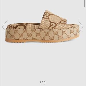 Gucci women’s platform slide sandal. Size 8/38